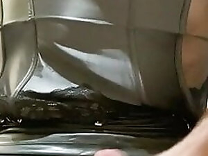 CD latex slut spilling cum in shiny panties