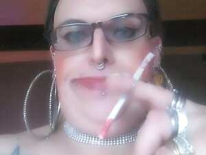 StefanieTs with piercings and tattoos smoking